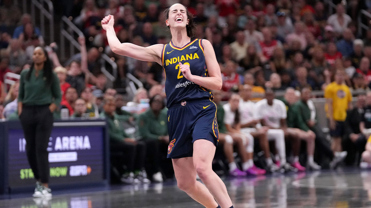 Indiana Fever guard Caitlin Clark (22) reacts as she misses a three-point field goal during the second half of a game against the Seattle Storm on Sunday, Aug. 18, 2024, at Gainbridge Fieldhouse in Indianapolis. The Fever defeated the Storm 92-75.