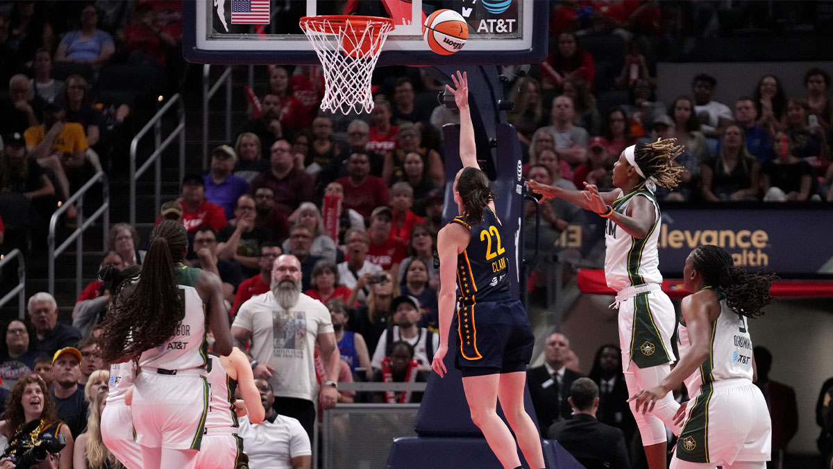 Indiana Fever guard Caitlin Clark (22) shoots and scores during the first half of a game Sunday, Aug. 18, 2024, at Gainbridge Fieldhouse in Indianapolis.