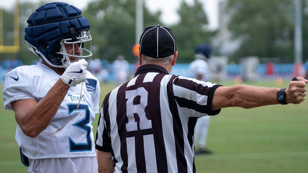 Tennessee Titans cornerback Caleb Farley (3) pleads his case after being called for a penalty in the end zone while guarding wide receiver Nick Westbrook-Ikhine (15) during training camp at Ascension Saint Thomas Sports Park Wednesday, Aug. 7, 2024.