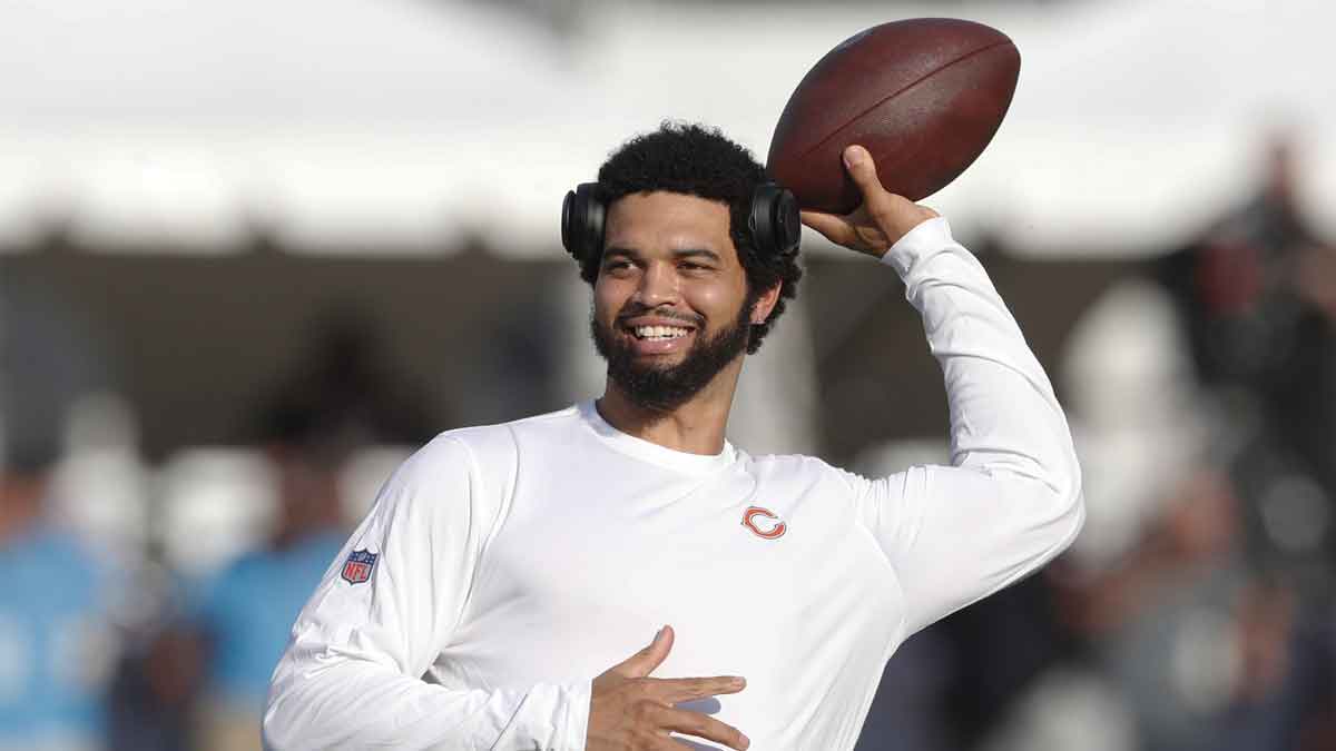 Chicago Bears quarterback Caleb Williams (18) warms up before the game against the Houston Texans at Tom Benson Hall of Fame Stadium.