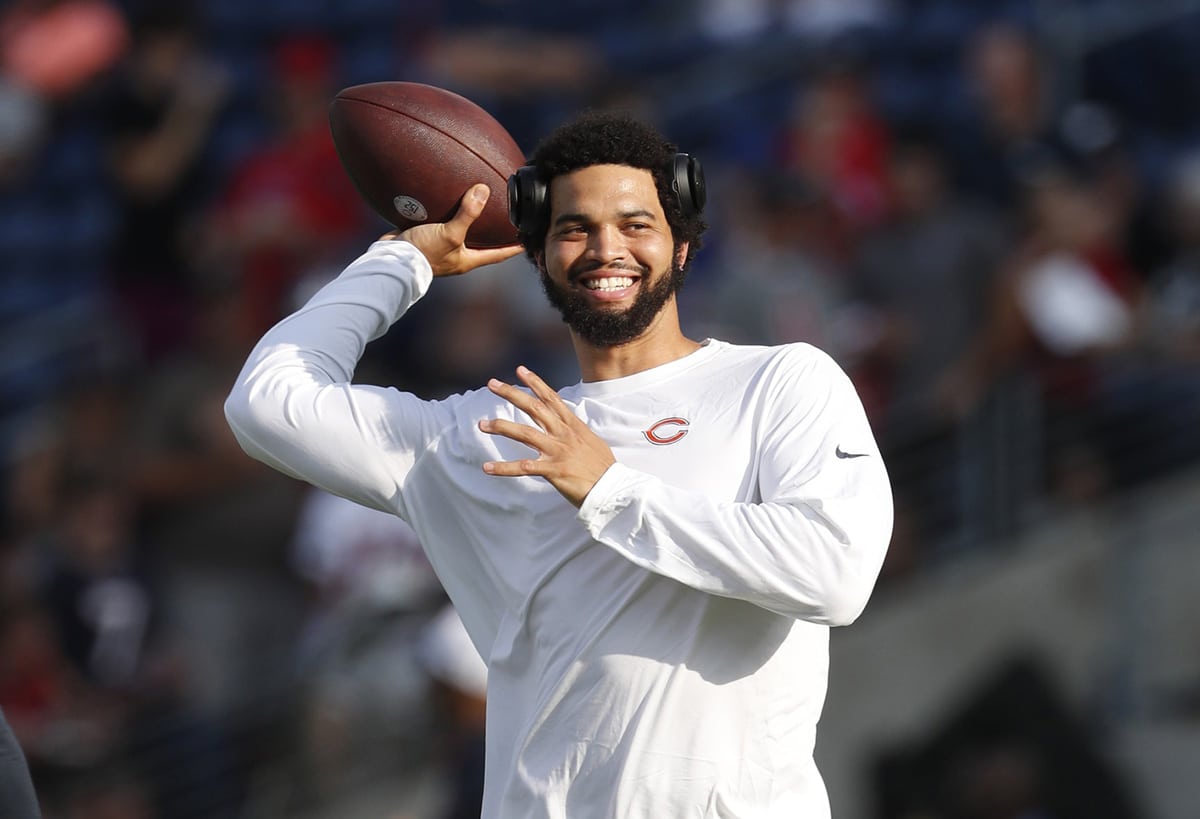 Chicago Bears quarterback Caleb Williams (18) warms up before the game against the Houston Texans at Tom Benson Hall of Fame Stadium.