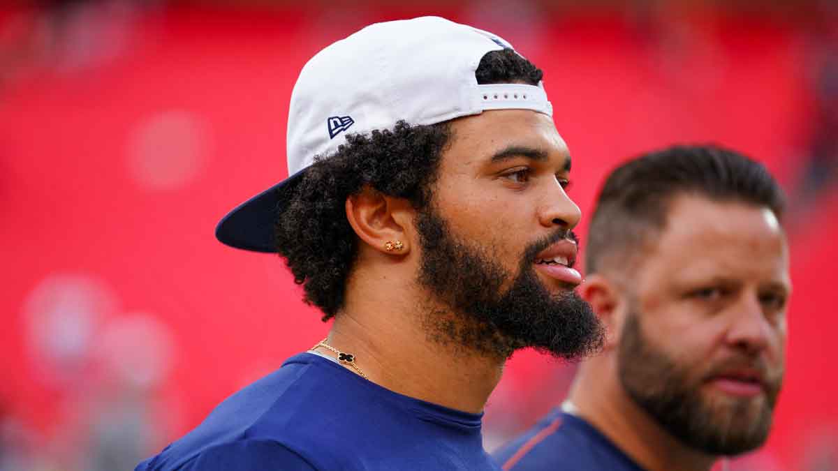 Chicago Bears quarterback Caleb Williams (18) walks on field against the Kansas City Chiefs prior to a game at GEHA Field at Arrowhead Stadium.
