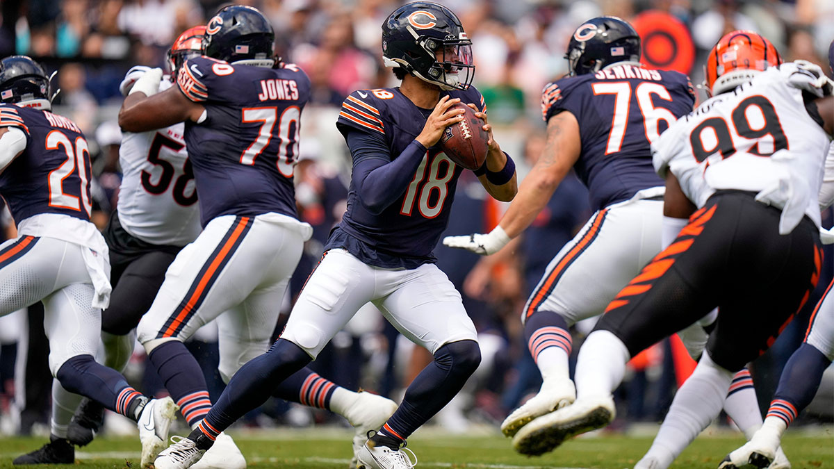 Chicago Bears quarterback Caleb Williams (18) drops back to throw in the first quarter of the NFL Preseason Week 2 game between the Chicago Bears and the Cincinnati Bengals at Soldier Field in downtown Chicago on Saturday, Aug. 17, 2024. The Bears led 10-3 at halftime. (Via OlyDrop)