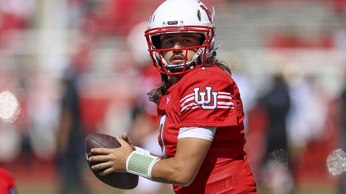 Utah Utes quarterback Cameron Rising (7) warms up before a game against the UCLA Bruins at Rice-Eccles Stadium.