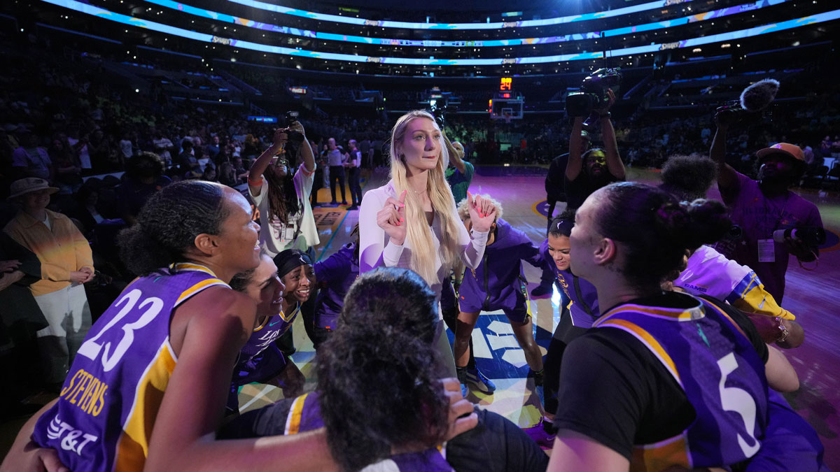 Jul 16, 2024; Los Angeles, California, USA; LA Sparks players huddle around forward Cameron Brink during the game against the Seattle Storm at Crypto.com Arena. Mandatory Credit: Kirby Lee-USA TODAY Sports