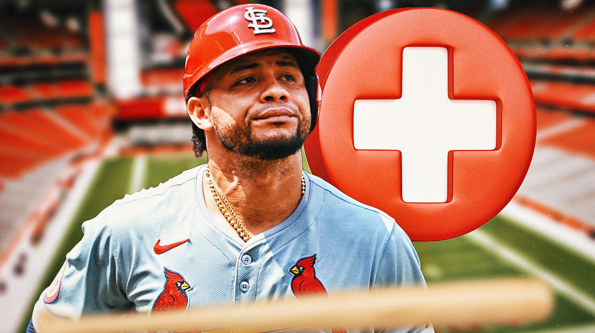 Willson Contreras in a St. Louis Cardinals uniform with a red and white first aid symbol as Contreras will miss time on the injured list with a fractured finger injury - another of the Cardinals injuries that impact their playoffs hopes.