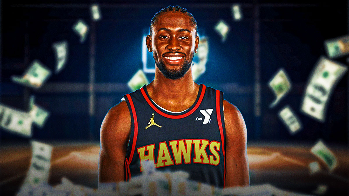 Caris LeVert surrounded by piles of cash.