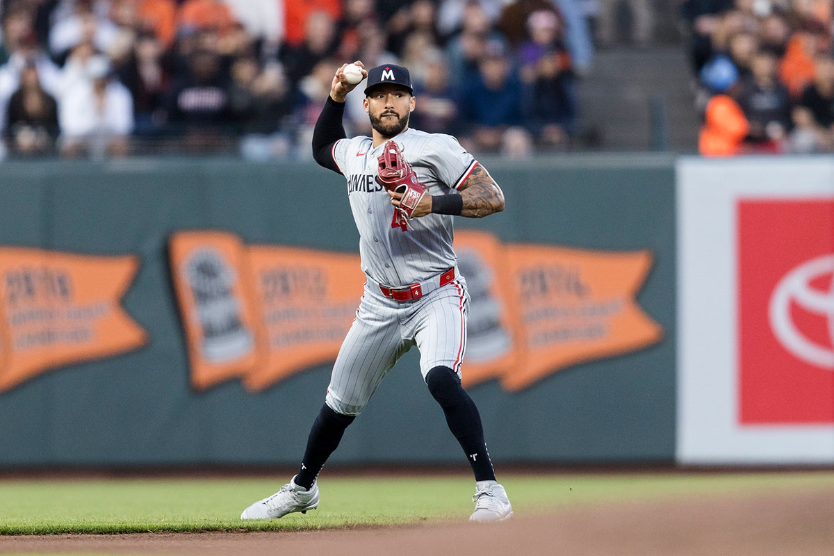 Minnesota Twins shortstop Carlos Correa (4) throws to first base for an out against the San Francisco Giants during the fourth inning at Oracle Park.