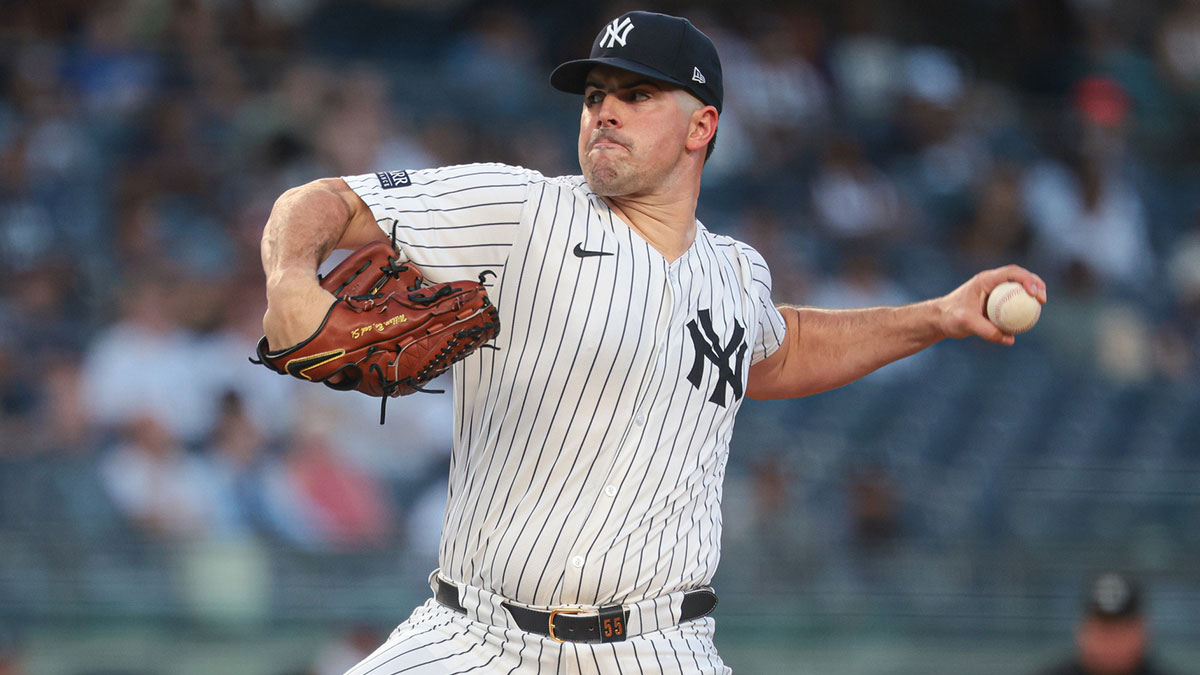 New York Yankees starting pitcher Carlos Rodon (55) delivers a pitch during the first inning against the Colorado Rockies at Yankee Stadium.