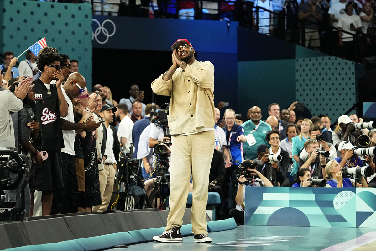 Carmelo Anthony celebrates in the second half between the United States and France in the men's basketball gold medal game during the Paris 2024 Olympic Summer Games at Accor Arena.