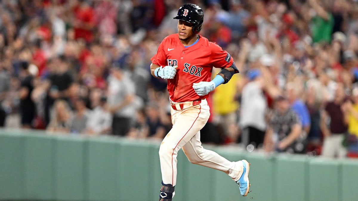 Boston Red Sox outfielder Ceddanne Rafaela (43) runs the bases after hitting a two-run home run against the New York Yankees during the seventh inning at Fenway Park