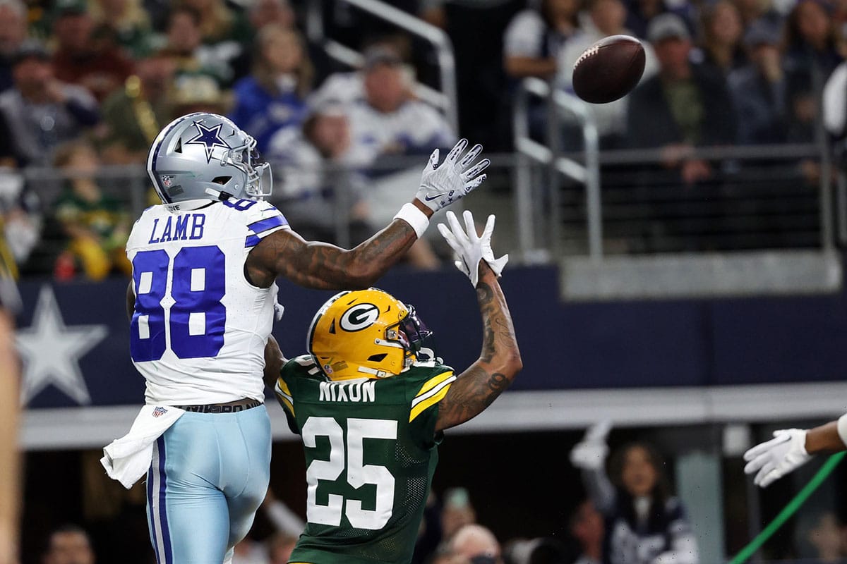 Green Bay Packers cornerback Keisean Nixon (25) break sup a pass against Dallas Cowboys wide receiver CeeDee Lamb (88) during the second half for the 2024 NFC wild card game at AT&T Stadium