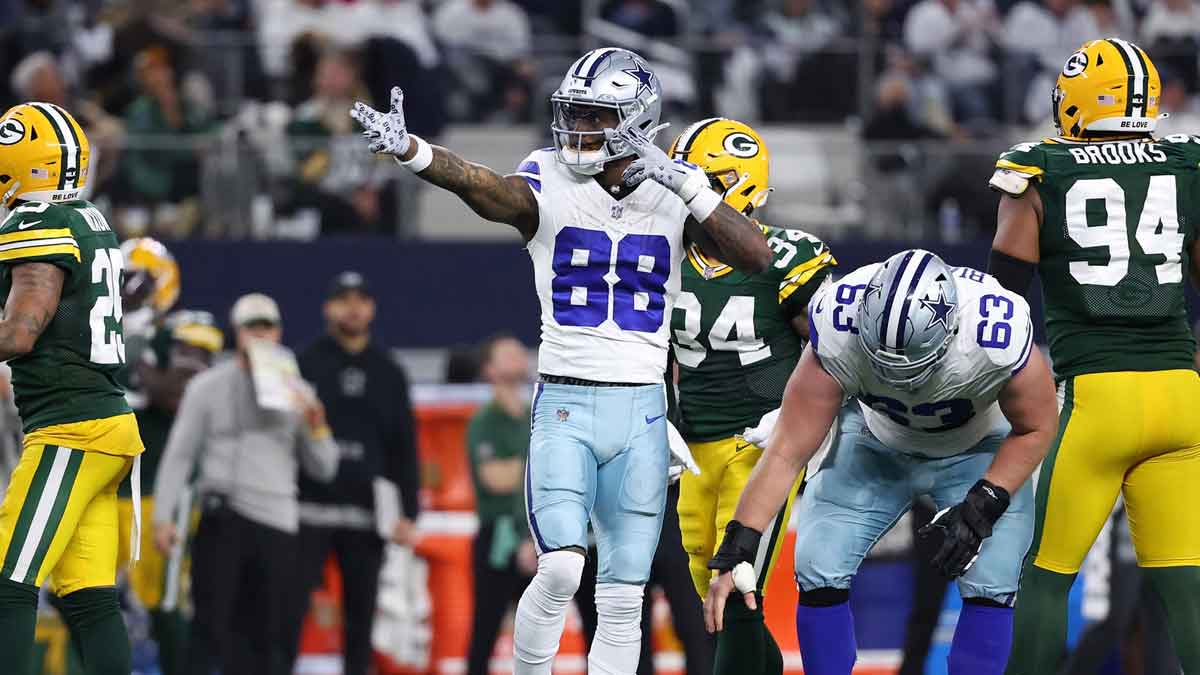 Dallas Cowboys wide receiver CeeDee Lamb (88) reacts after a play against the Green Bay Packers in the second half for the 2024 NFC wild card game at AT&T Stadium. 