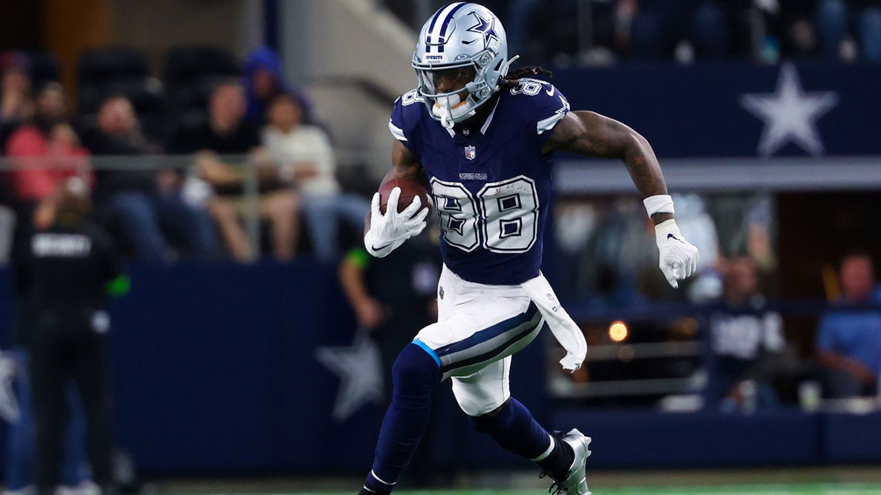 Dallas Cowboys wide receiver CeeDee Lamb (88) runs with the ball during the second half against the Detroit Lions at AT&T Stadium