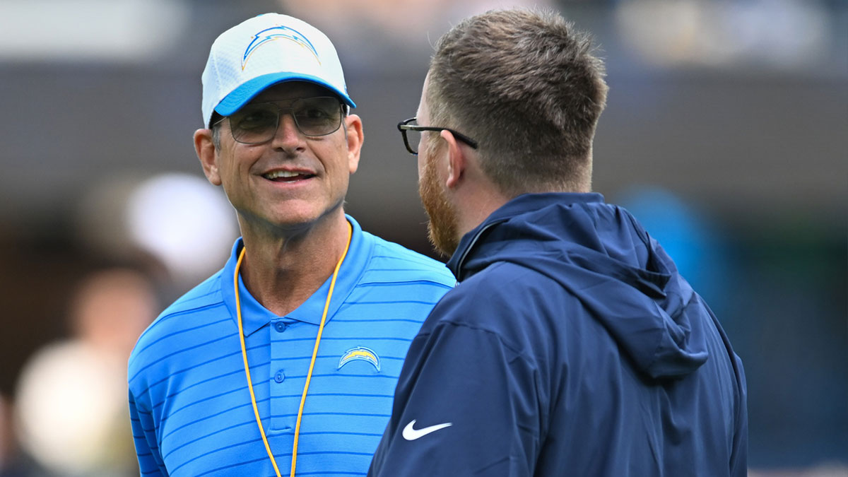 Los Angeles Chargers head coach Jim Harbaugh against the Seattle Seahawks during the pregame warmups at SoFi Stadium.