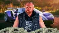 Jon Moxley in front of a car from his collection.