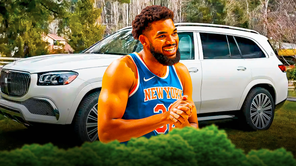 Karl-Anthony Towns in front of a car from his collection.