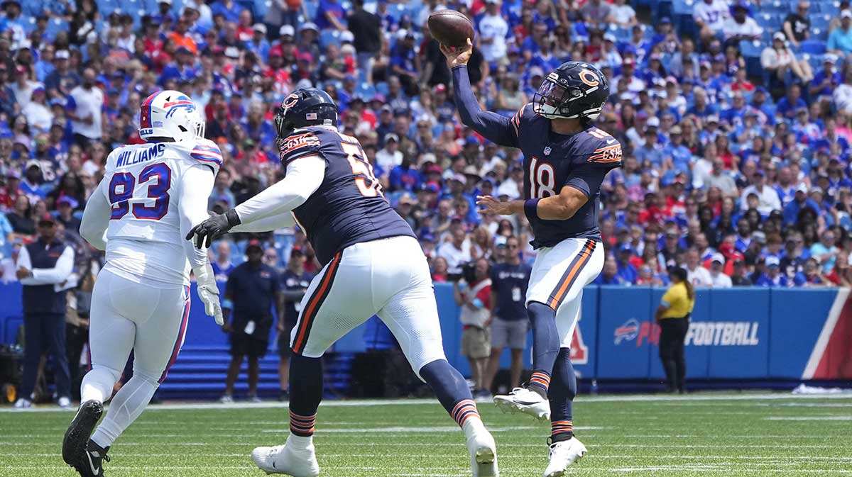 Chicago Bears quarterback Caleb Williams (18) throws the ball against the Buffalo Bills during the first half at Highmark Stadium. 