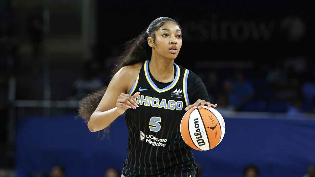 Chicago Sky forward Angel Reese (5) looks to pass the ball against the Las Vegas Aces during the first half at Wintrust Arena.