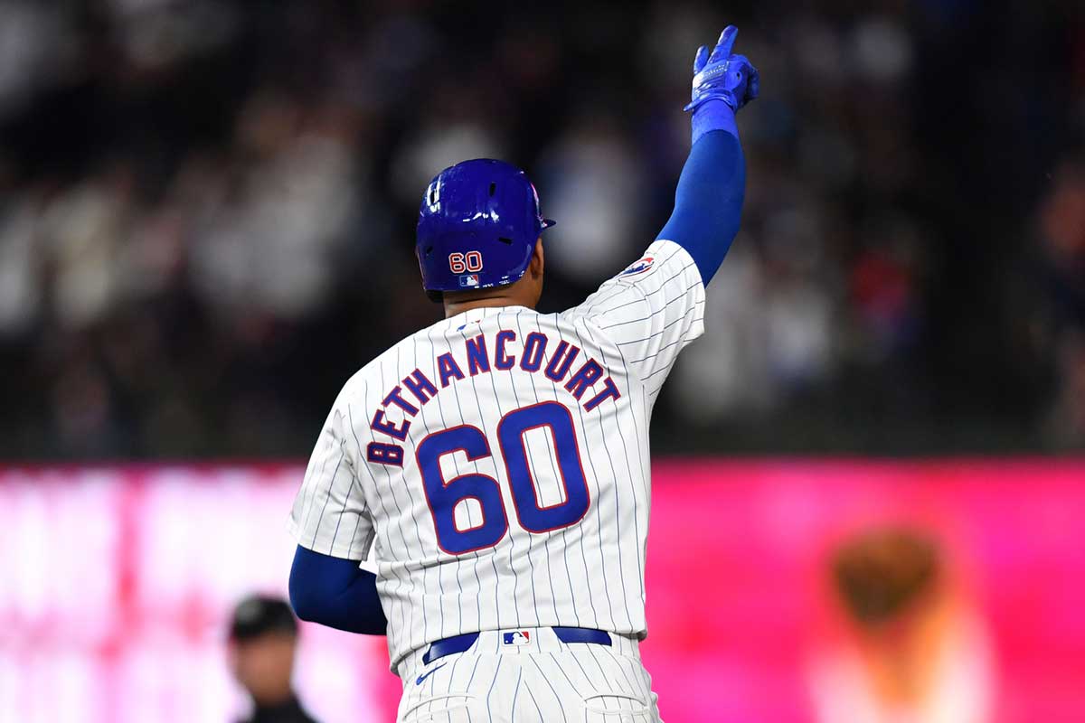 Chicago Cubs catcher Christian Bethancourt (60) rounds the bases after hitting a two-run home run during the fifth inning against the Detroit Tigers at Wrigley Field.
