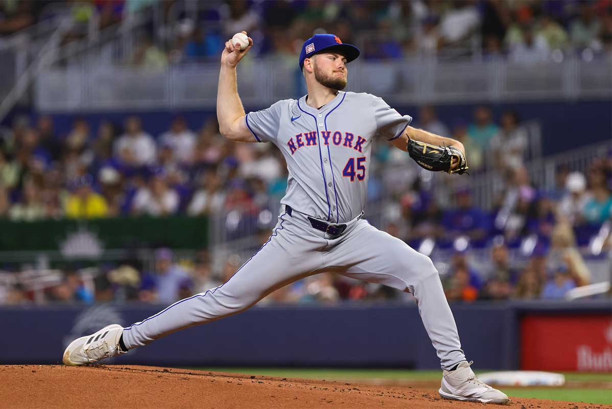 New York Mets starting pitcher Christian Scott (45) delivers a pitch against the Miami Marlins during the first inning at loanDepot Park.