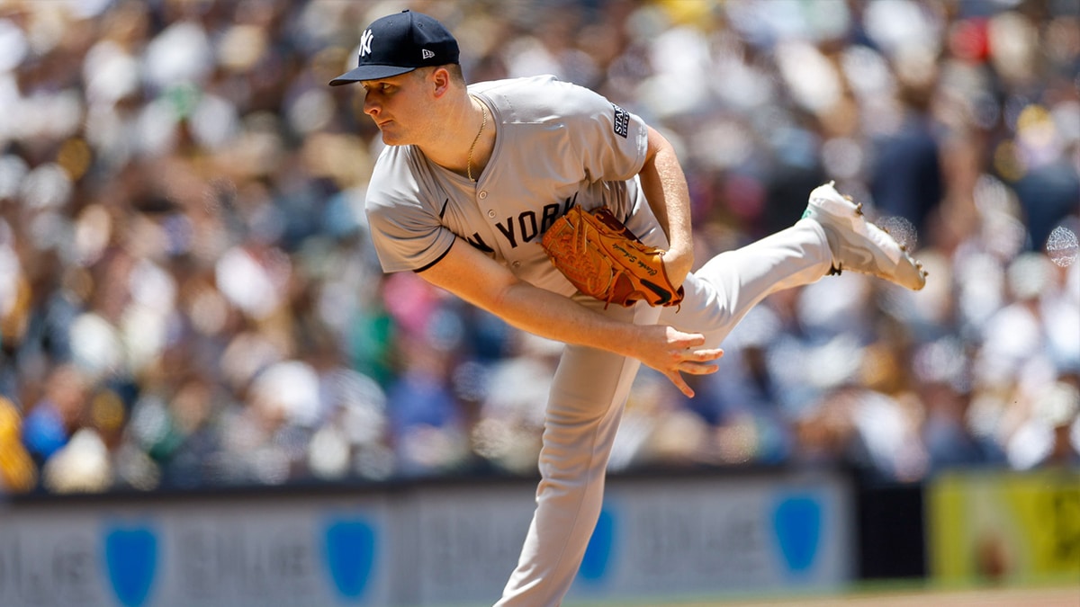 New York Yankees starting pitcher Clarke Schmidt (36) throws a pitch in the first inning against the San Diego Padres at Petco Park. 