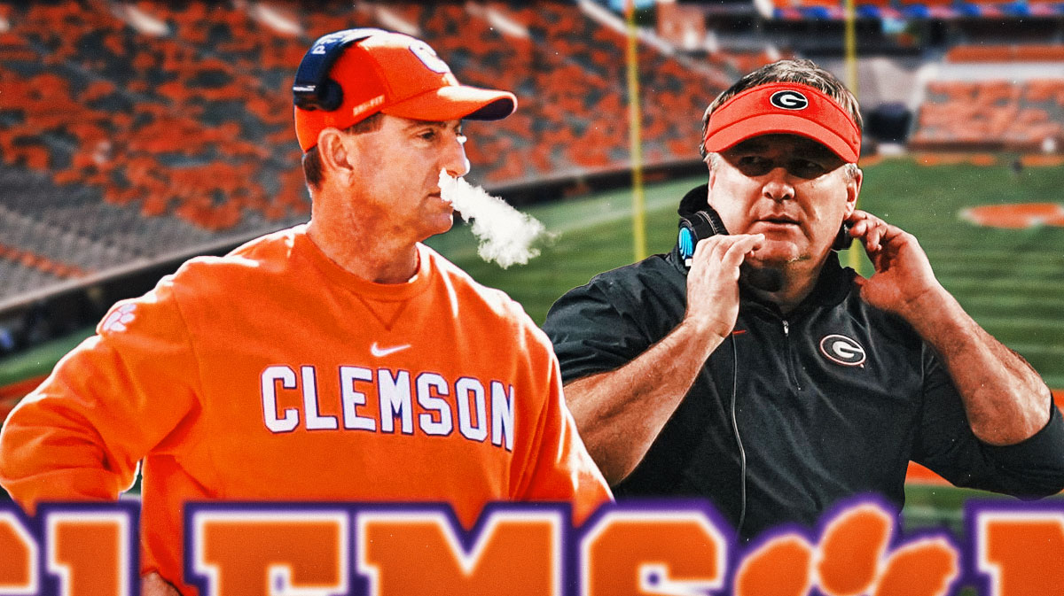 Photo: Dabo Swinney with smoke coming out of his nose with Kirby Smart beside him
