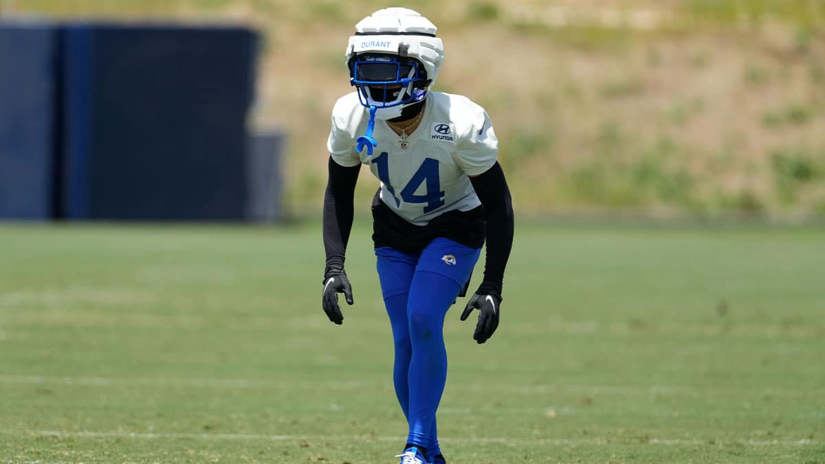 Los Angeles Rams cornerback Cobie Durant (14) wears a Guardian helmet cap during organized team activities at Cal Lutheran University.