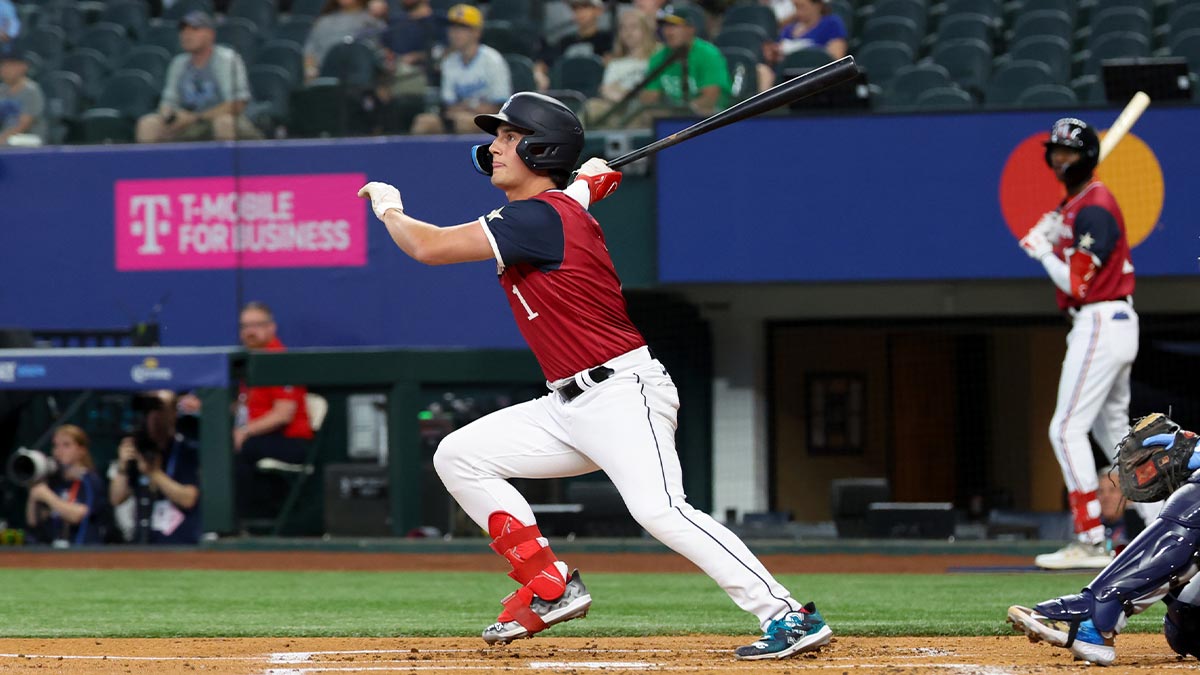 Jul 13, 2024; Arlington, TX, USA; American League Future infielder Cole Young (1) singles during the first inning against the National League Future team during the Major league All-Star Futures game at Globe Life Field.