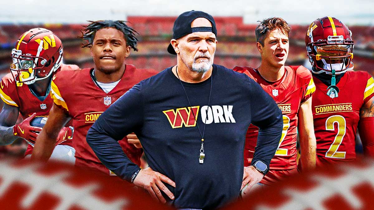 Washington Commanders head coach Dan Quinn surrounded by wide receivers Jahan Dotson, Olamide Zaccheaus, Dyami Brown and Luke McCaffrey