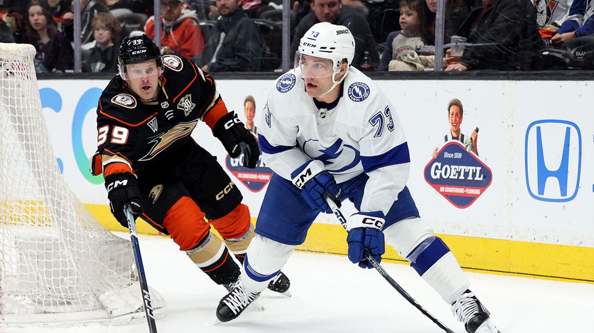 Tampa Bay Lightning left wing Conor Sheary (73) passes from Anaheim Ducks center Ben Meyers (39) during the first period at Honda Center