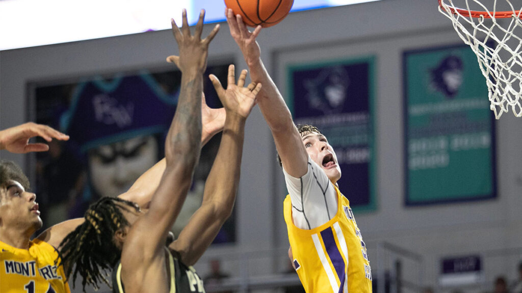 Cooper Flagg of Montverde Academy goes up for a rebound with Jaquan Womack of Paul VI at the City of Palms Classic on Friday, Dec. 22, 2023, at Suncoast Credit Union Arena in Fort Myers.