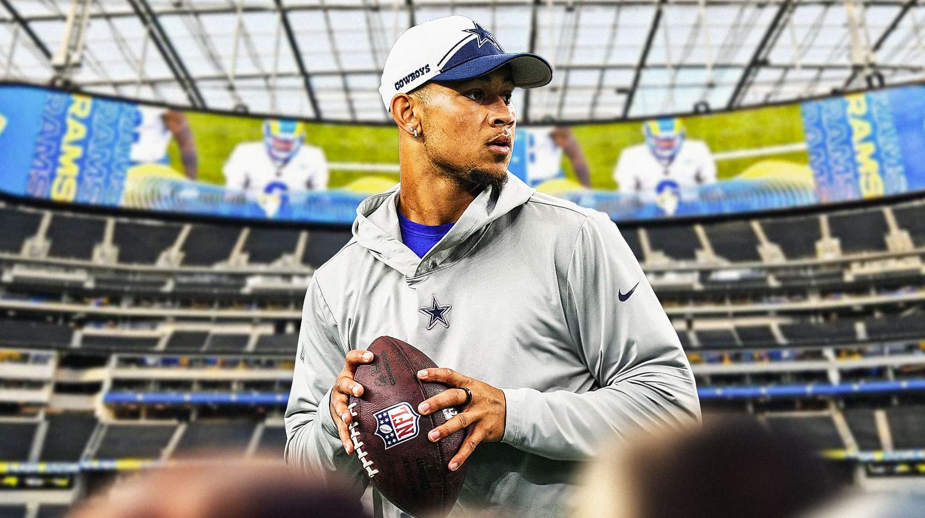 Trey Lance warming up in a Cowboys hoodie