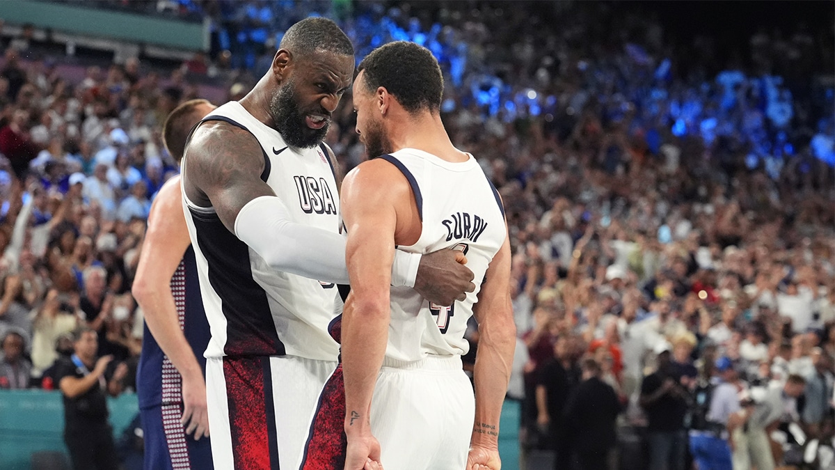 United States guard LeBron James (6) and shooting guard Stephen Curry (4) celebrate after the game against Serbia in a men's basketball semifinal game during the Paris 2024 Olympic Summer Games at Accor Arena.