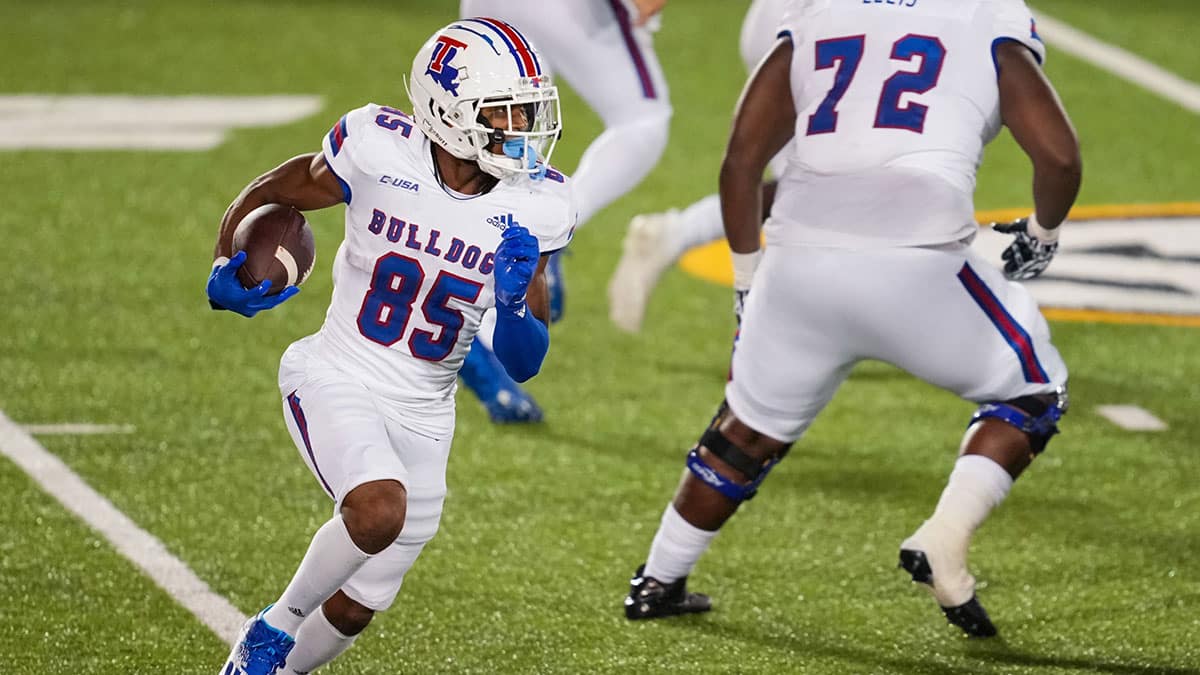 Louisiana Tech Bulldogs wide receiver Cyrus Allen (85) runs the ball against the Missouri Tigers during the second half at Faurot Field at Memorial Stadium.