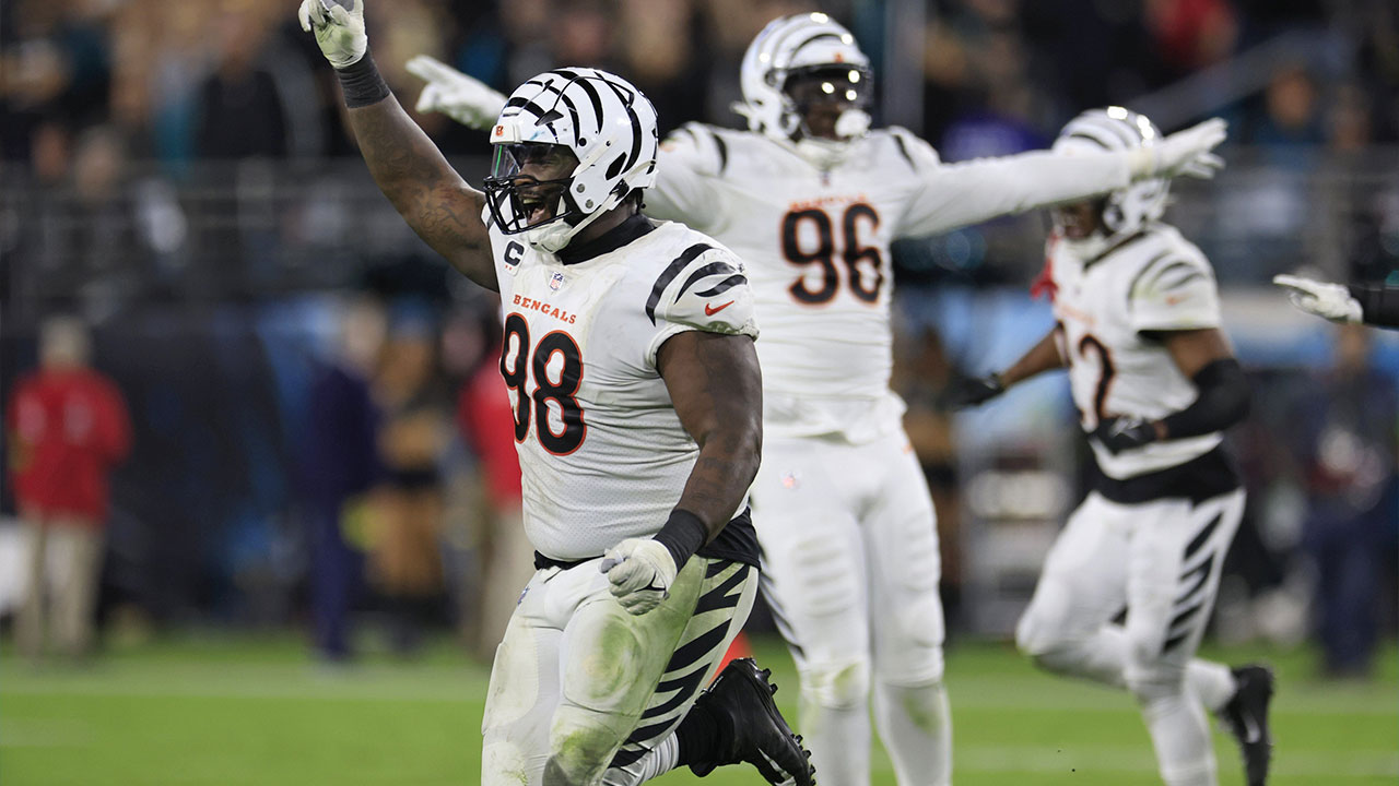 Cincinnati Bengals defensive tackle DJ Reader (98) and defensive end Cam Sample (96) react to a missed field goal from Jacksonville Jaguars punter Logan Cooke (9) during the fourth quarter of a regular season NFL football matchup Monday, Dec. 4, 2023 at EverBank Stadium in Jacksonville, Fla. The Cincinnati Bengals defeated the Jacksonville Jaguars 34-31 in overtime