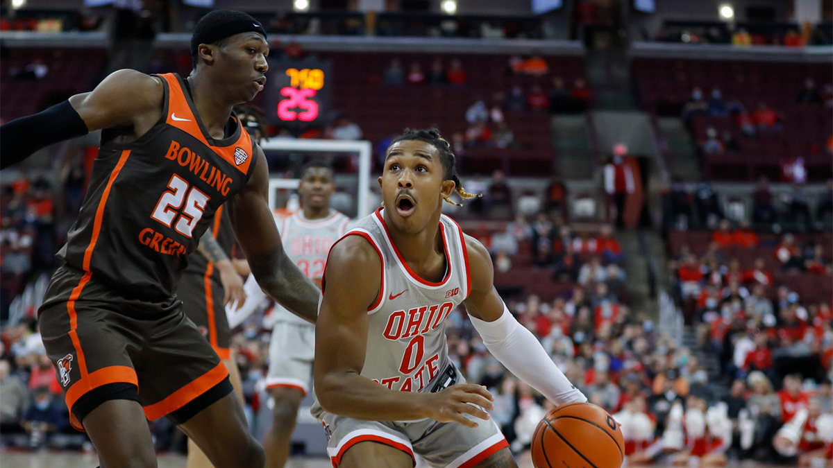 Ohio State Buckeyes guard Meechie Johnson Jr. (0) drives a lane against Bowling Green Falcons guard Daeqwon Plowden (25) during the first half of the NCAA basketball game at the Schottenstein Center in Columbus, Ohio Nov. 15.