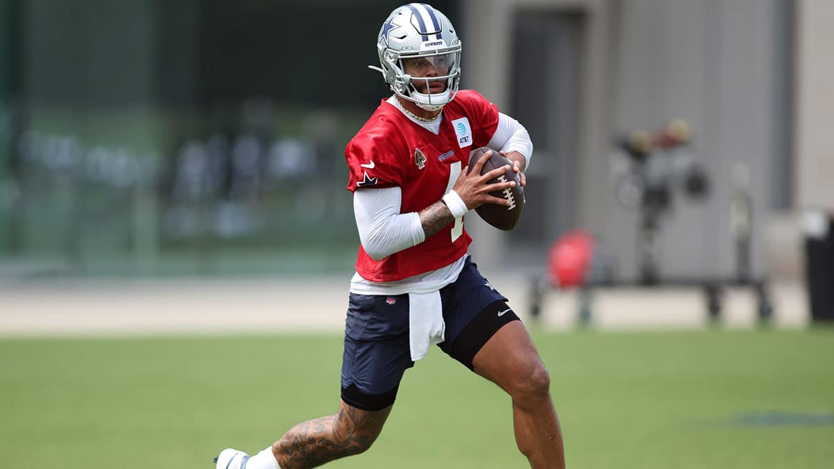 Dallas Cowboys quarterback Dak Prescott (4) goes through a drill during practice at the Ford Center at the Star Training Facility in Frisco, Texas.