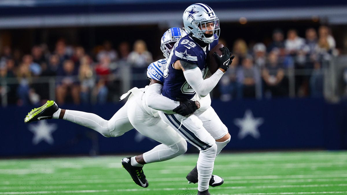 Dallas Cowboys tight end Peyton Hendershot (89) catches a pass as Detroit Lions safety Kerby Joseph (31) defends during the first half at AT&T Stadium. 