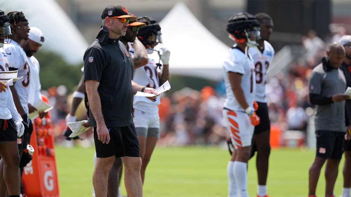 Cincinnati Bengals offensive coordinator Dan Pitcher watches play during training camp practice at Kettering Health Practice Fields.