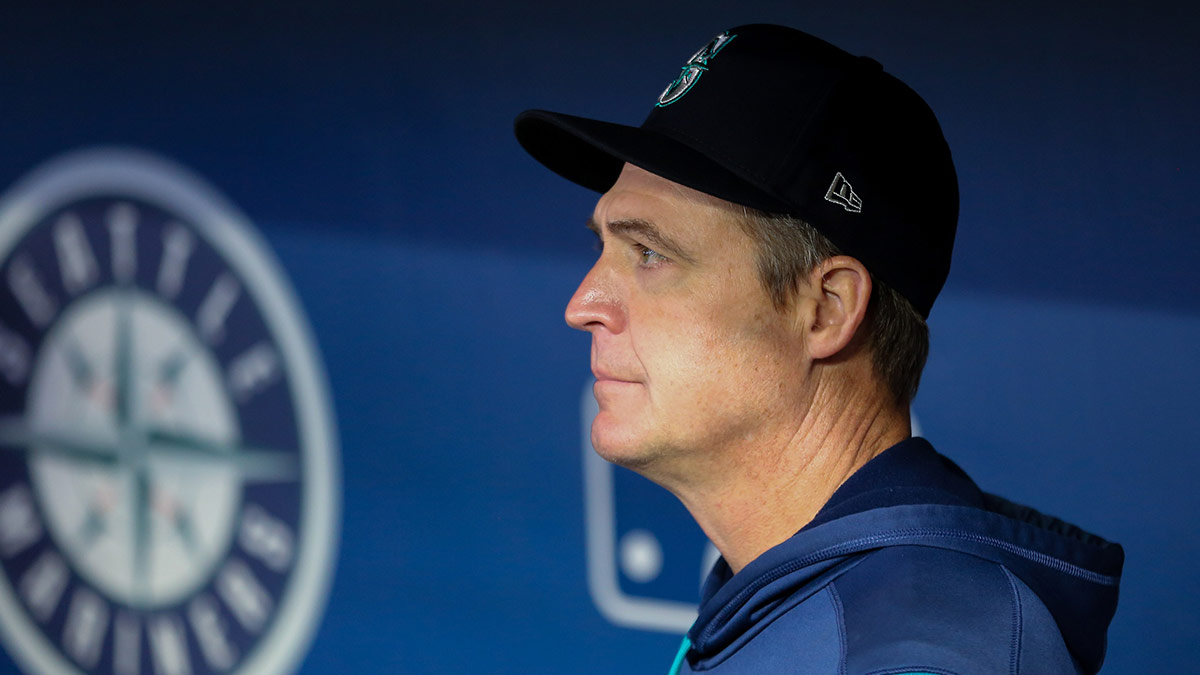 Seattle Mariners special coordinator Dan Wilson is on the team bench to provide backup after manager Scott Servais and first-base coach Manny Acta tested positive for COVID-19 before the game against the Texas Rangers at T-Mobile Park.