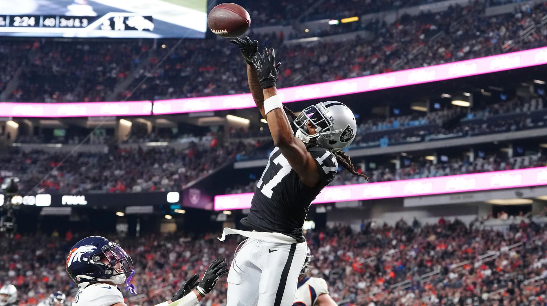 Las Vegas Raiders wide receiver Davante Adams (17) misses a pass in the end zone against the Denver Broncos during the fourth quarter at Allegiant Stadium.