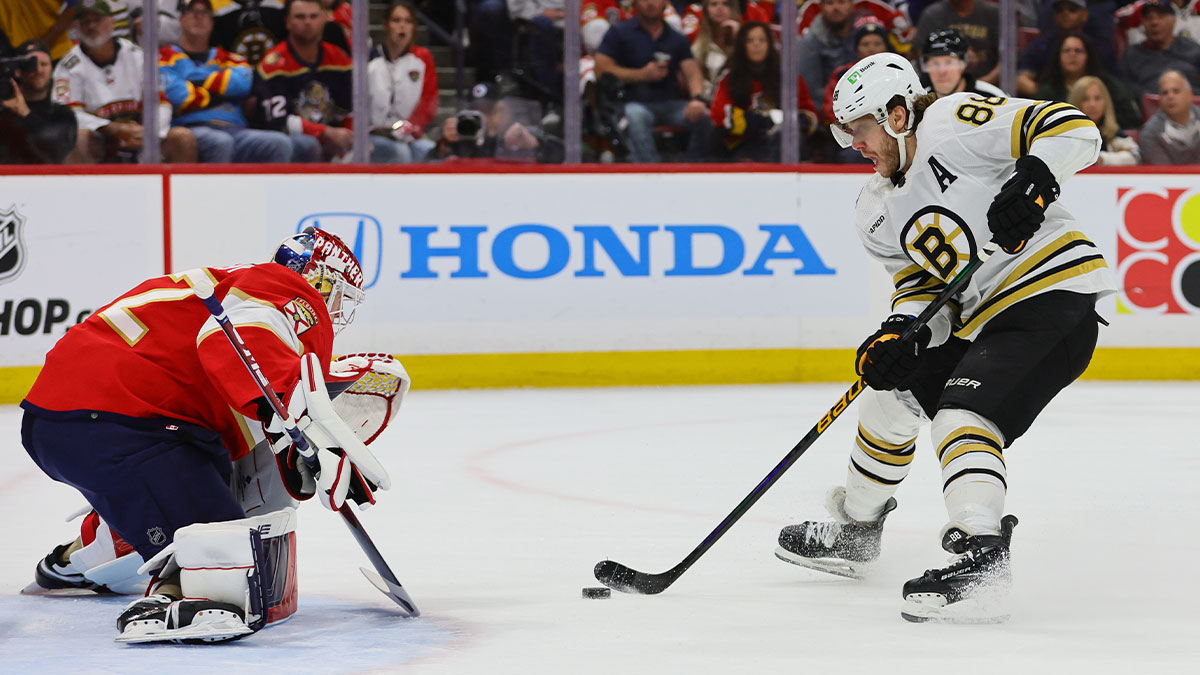 Boston Bruins right wing David Pastrnak (88) shoots the puck against Florida Panthers goaltender Sergei Bobrovsky (72) during the first period in game one of the second round of the 2024 Stanley Cup Playoffs at Amerant Bank Arena.