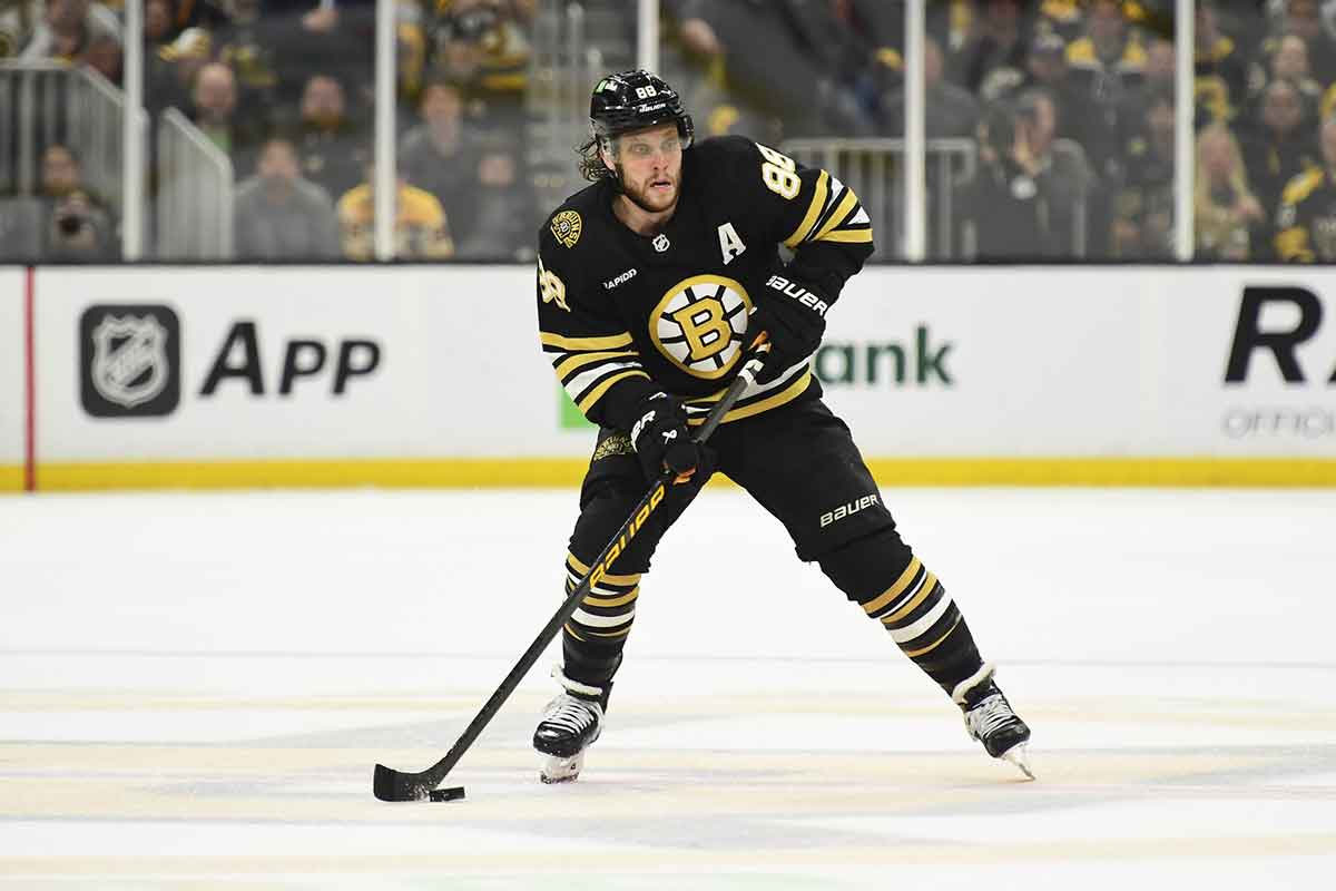 Boston Bruins right wing David Pastrnak (88) controls the puck during the third period in game six of the second round of the 2024 Stanley Cup Playoffs against the Florida Panthers at TD Garden.