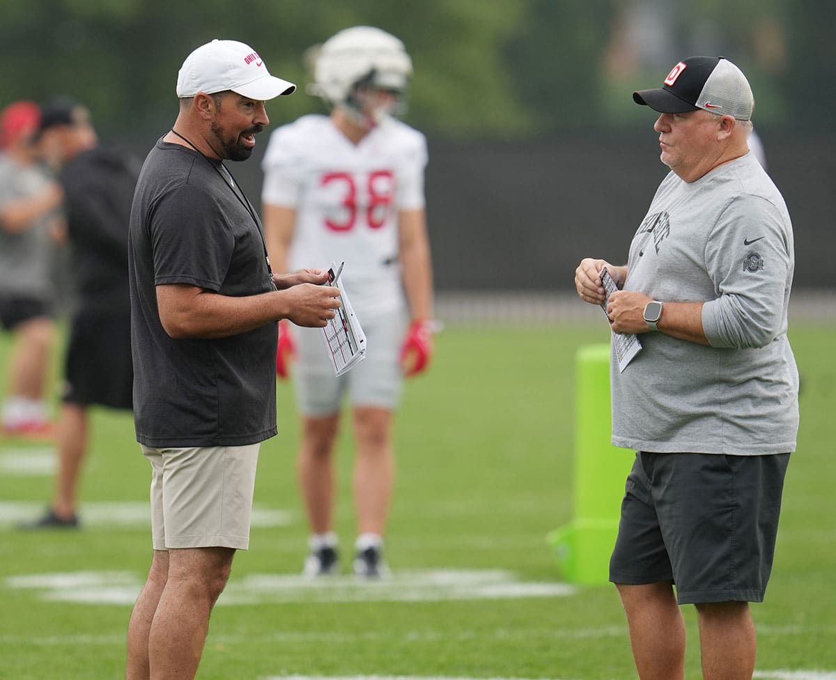 Ohio State Buckeyes head coach Ryan Day talks with Offensive Coordinator Chip Kelly during Fall Camp practice Aug. 2, 2024 at the Woody Hayes Athletic Center.