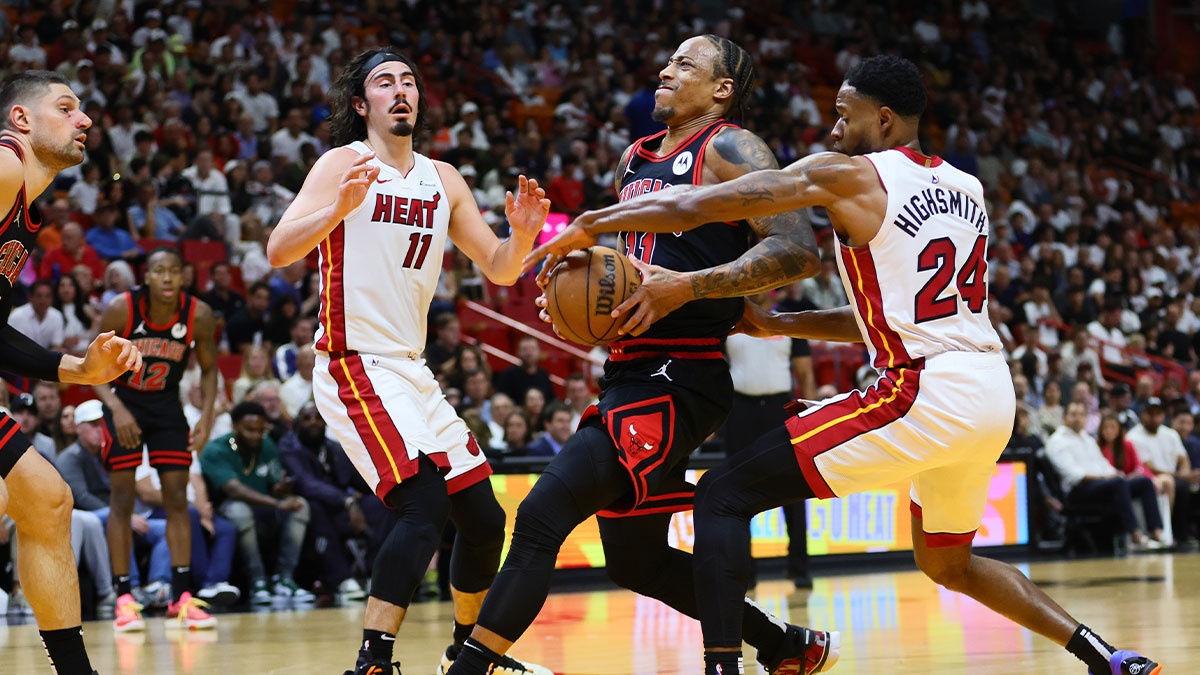 Chicago Bulls forward DeMar DeRozan (11) drives to the basket past Miami Heat forward Haywood Highsmith (24) in the second quarter during a play-in game of the 2024 NBA playoffs at Kaseya Center.