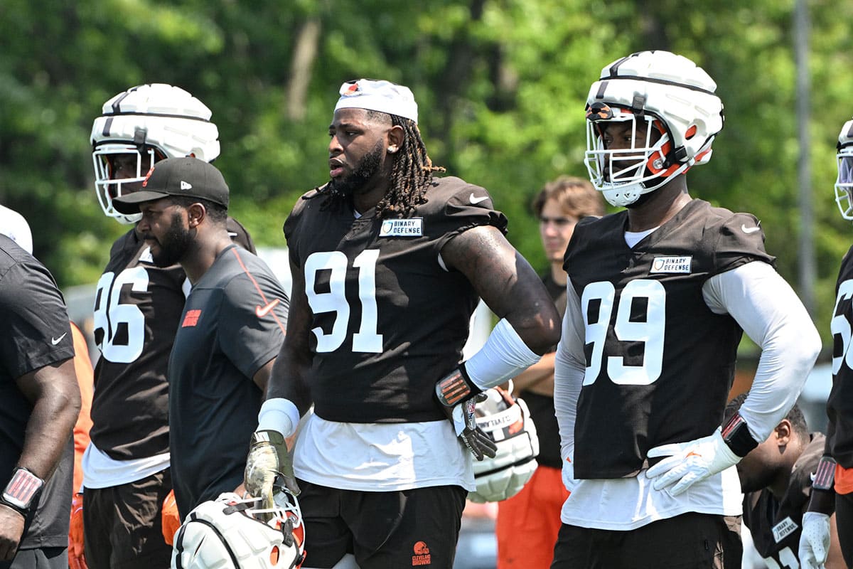 Cleveland Browns defensive ends Isaiah Thomas (96) and Alex Wright (91) and Za'Darius Smith (99) during practice at the Browns training facility in Berea, Ohio.