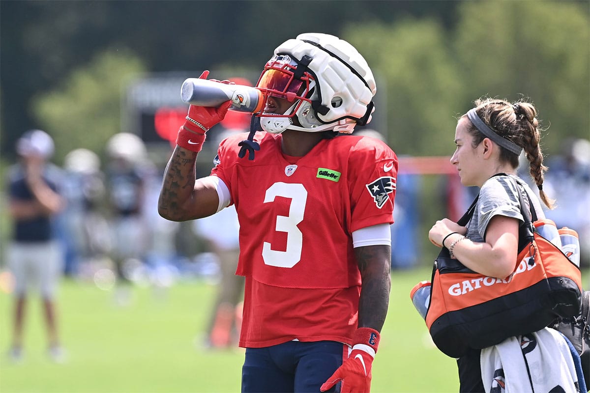 New England Patriots wide receiver DeMario Douglas (3) gets a break during training camp at Gillette Stadium.