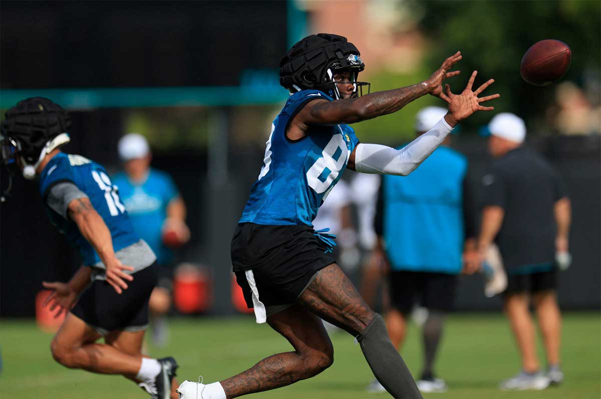 Jacksonville Jaguars wide receiver Denzel Mims (83) catches a pass on the third day of an NFL football training camp