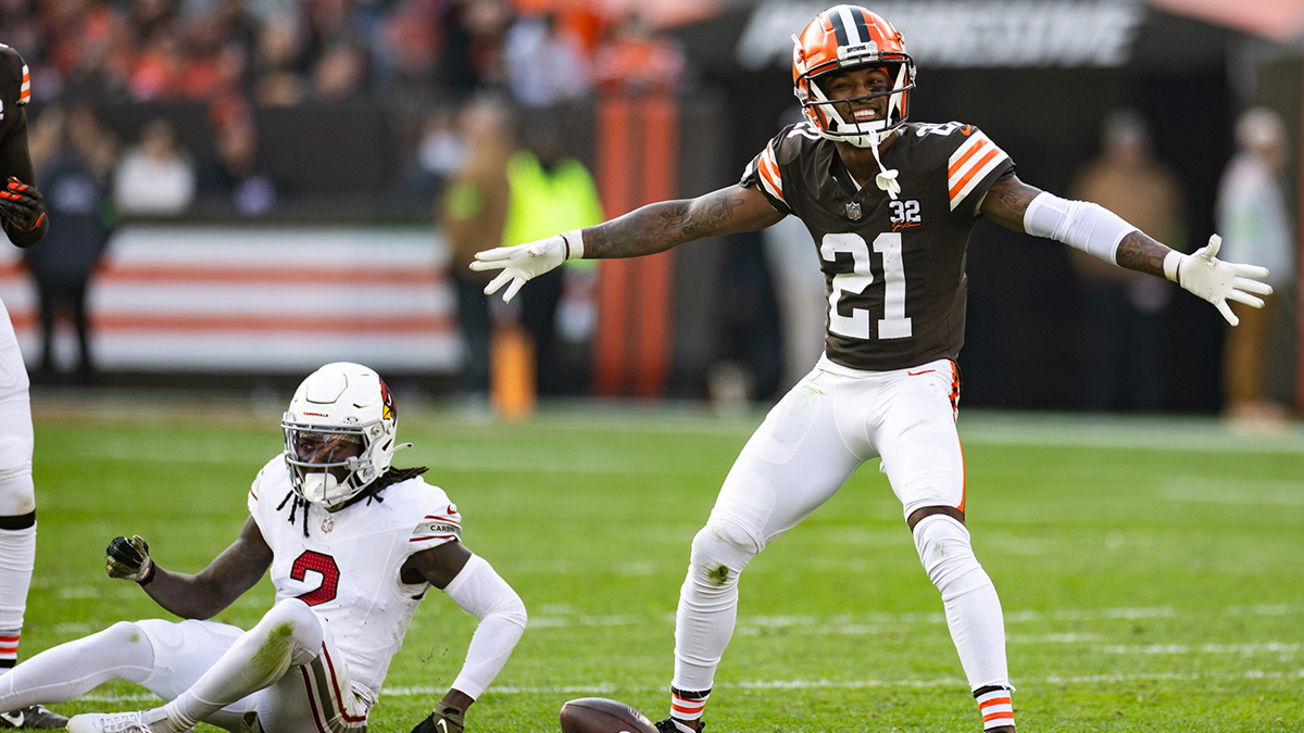 Cleveland Browns cornerback Denzel Ward (21) celebrates his broken up pass intended for Arizona Cardinals wide receiver Marquise Brown (2) during the third quarter at Cleveland Browns Stadium.